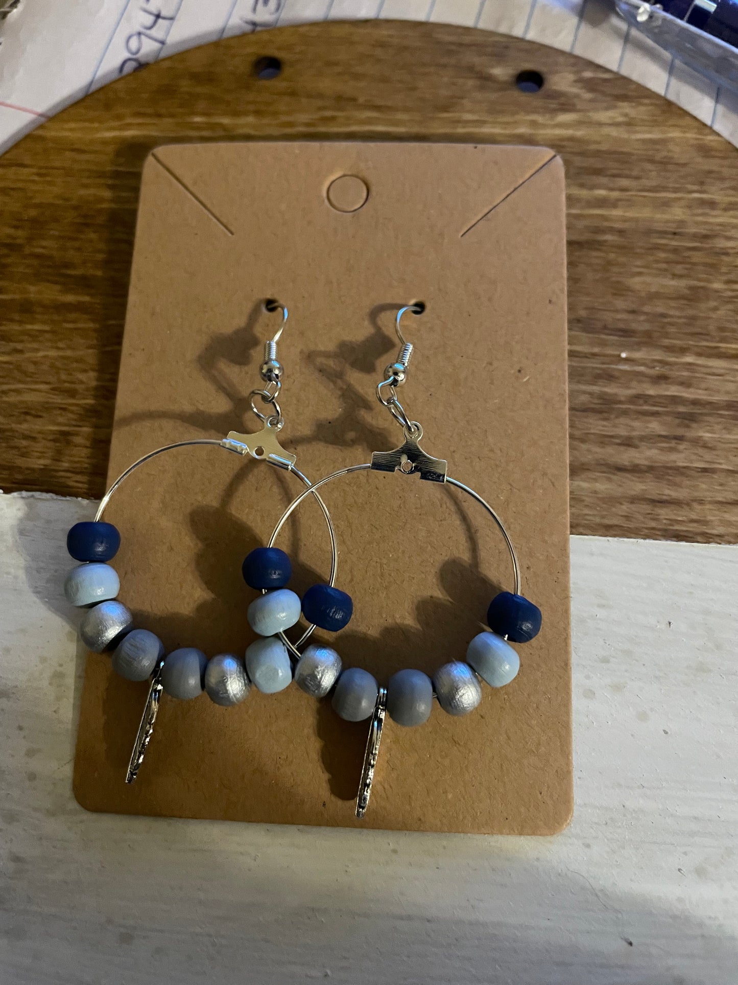 Blue, lightweight earrings with silver feather